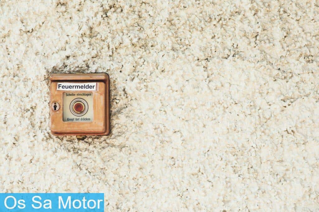 an old fashioned camera on a white carpet
