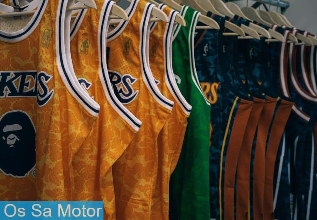 assorted NBA jerseys hanged on clothes hangers